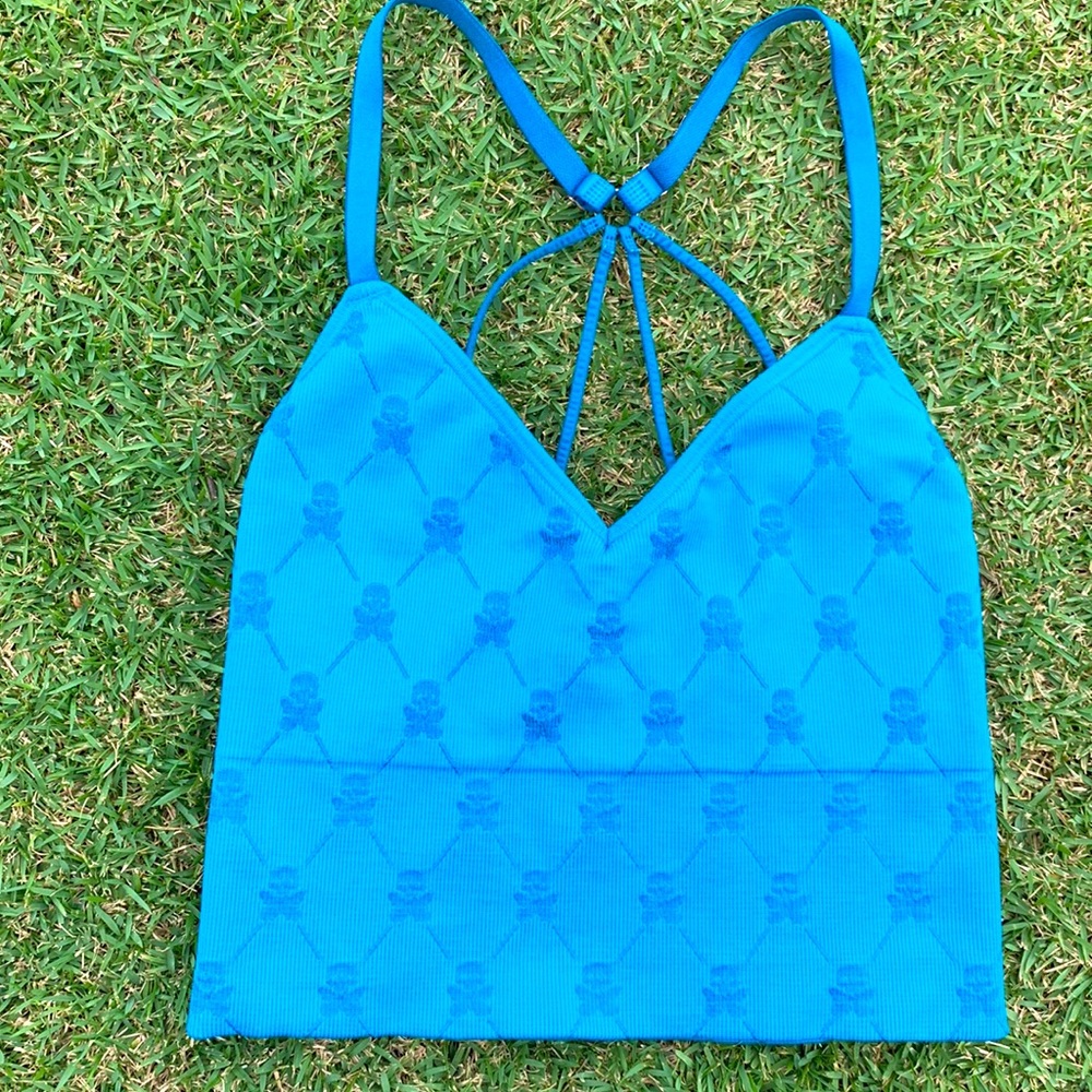 Betty Designs Turquoise Sports Bra in a size Small.
